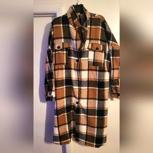 Tan and black women's plaid shacket button-up from Fashion Nova